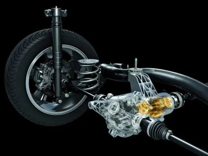Przekładnia z widocznym mechanizmem napędu 4x4 dołączany automatycznie. Widoczna sprężyna, amortyzator i półosie.